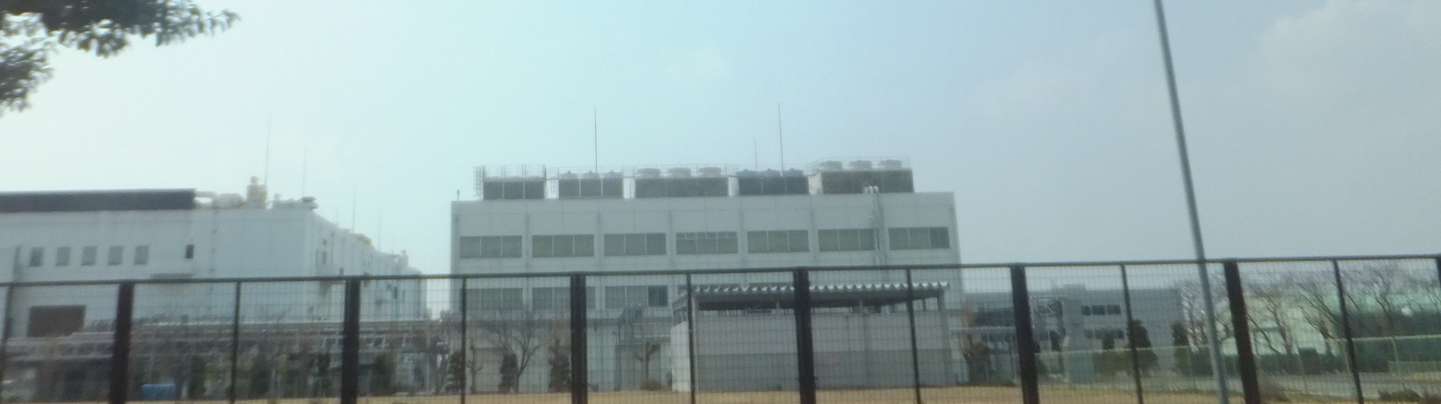 Engineers working inside a semiconductor assembly facility